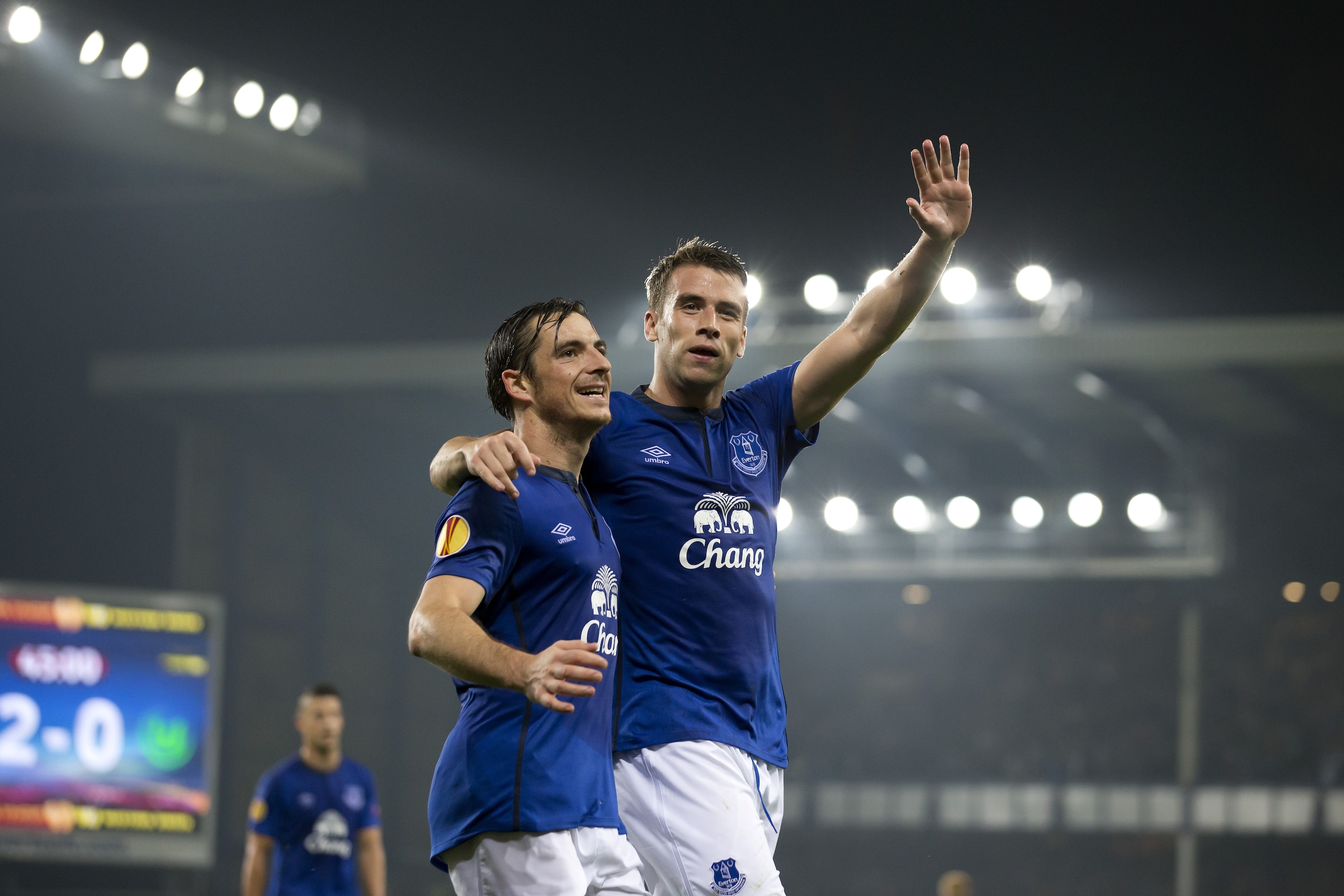 Everton's Seamus Coleman, centre right, celebrates alongside teammate Leighton Baines after scoring against Wolfsburg during their Europa League Group H soccer match at Goodison Park Stadium, Liverpool, England, Thursday Sept. 18, 2014. (AP Photo/Jon Super)