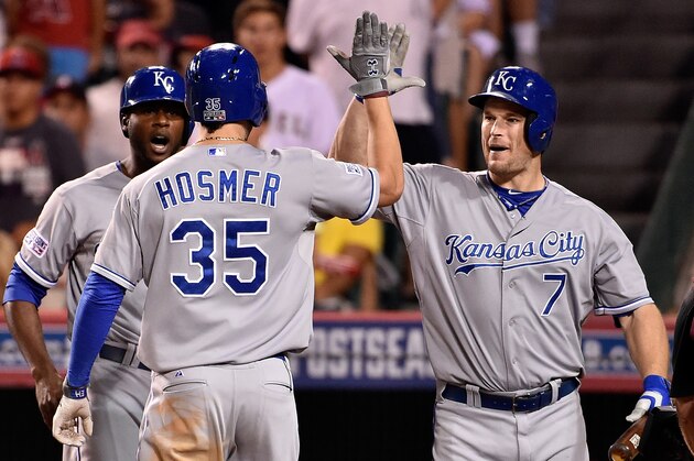 ANAHEIM, CA - OCTOBER 03:  Eric Hosmer #35 celebrates with Lorenzo Cain #6 and Josh Willingham #7 of the Kansas City Royals after hitting a two-run home run in the elventh inning against the Los Angeles Angels during Game Two of the American League Division Series at Angel Stadium of Anaheim on October 3, 2014 in Anaheim, California.  (Photo by Denis Poroy/Getty Images)
