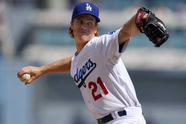 Los Angeles Dodgers starting pitcher Zack Greinke throws to the plate during the first inning of a baseball game against the Colorado Rockies, Sunday, Sept. 28, 2014, in Los Angeles. (AP Photo/Mark J. Terrill)