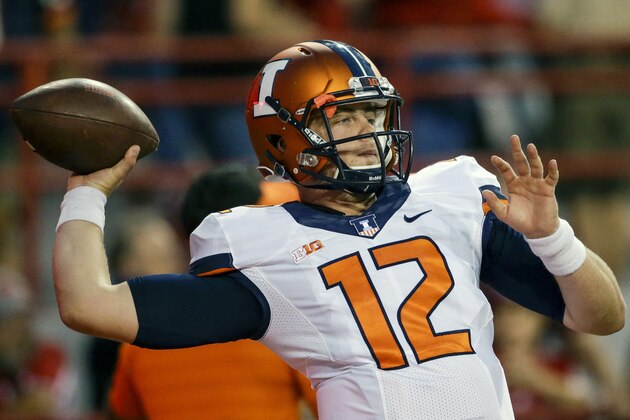 Illinois quarterback Wes Lunt (12) throws before an NCAA college football game against Nebraska in Lincoln, Neb., Saturday, Sept. 27, 2014. (AP Photo/Nati Harnik)
