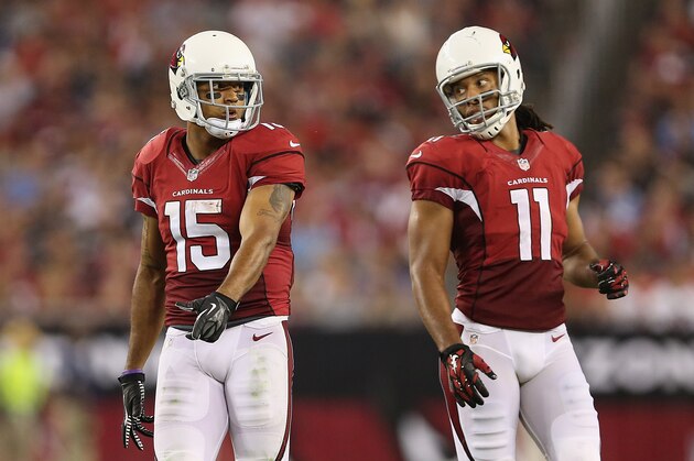 GLENDALE, AZ - SEPTEMBER 08:  Wide receivers Michael Floyd #15 and  Larry Fitzgerald #11 of the Arizona Cardinals during the NFL game against the San Diego Chargers at the University of Phoenix Stadium on September 8, 2014 in Glendale, Arizona.  The Cardinals defeated the Chargers 18-17.  (Photo by Christian Petersen/Getty Images)