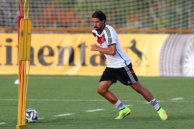 SANTO ANDRE, BRAZIL - JUNE 18: Sami Khedira of Germany runs with the ball during the German national team training at Campo Bahia on June 18, 2014 in Santo Andre, Brazil.  (Photo by Martin Rose/Getty Images)