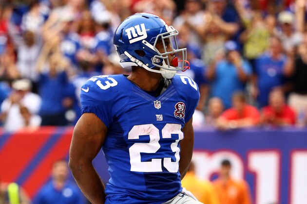 EAST RUTHERFORD, NJ - SEPTEMBER 21:  Rashad Jennings #23 of the New York Giants celebrates a touchdown in the second quarter against the Houston Texans at MetLife Stadium on September 21, 2014 in East Rutherford, New Jersey.  (Photo by Al Bello/Getty Images)