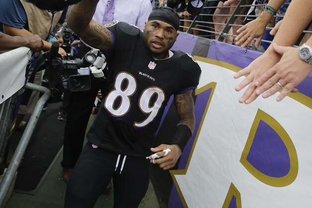 Baltimore Ravens wide receiver Steve Smith (89) leaves the field after an NFL football game against the Carolina Panthers in Baltimore, Sunday, Sept. 28, 2014. The Ravens defeated the Panthers 38-10. (AP Photo/Patrick Semansky)
