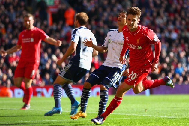 LIVERPOOL, ENGLAND - OCTOBER 04: Adam Lallana of Liverpool turns to celebrate after scoring the opening goal during the Barclays Premier League match between Liverpool and West Bromwich Albion at Anfield on October 4, 2014 in Liverpool, England. (Photo by Clive Brunskill/Getty Images) LIVERPOOL, ENGLAND - OCTOBER 04: Adam Lallana of Liverpool turns to celebrate after scoring the opening goal during the Barclays Premier League match between Liverpool and West Bromwich Albion at Anfield on October 4, 2014 in Liverpool, England. (Photo by Clive Brunskill/Getty Images)
