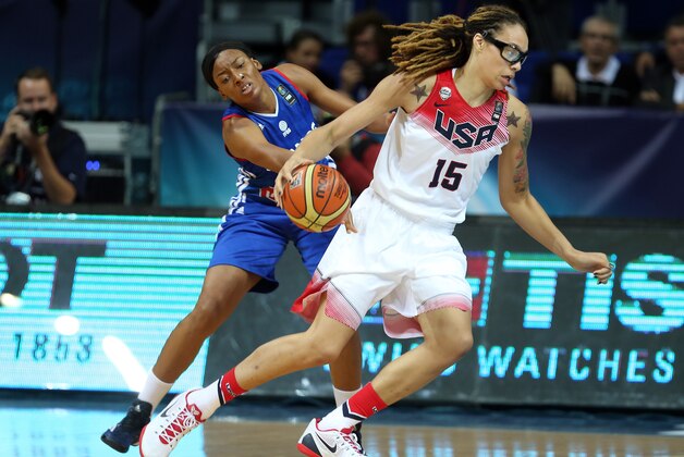 ISTANBUL, TURKEY -  OCTOBER 3: Brittney Griner of USA is in action with Diandra Tchatchouang of France during the 2014 FIBA Women's World Championship quarter-final basketball match between USA vs France at Fenerbahce Ulker Sports Arena on October 3, 2014 in Istanbul, Turkey  (Photo by Stringer/Getty Images)