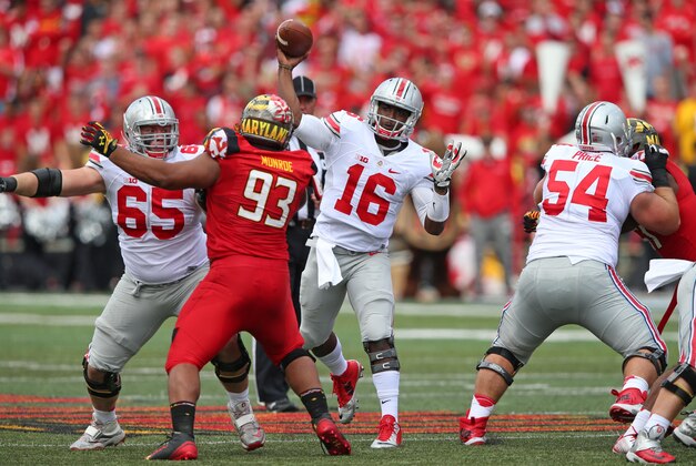 Oct 4, 2014; College Park, MD, USA; Ohio State Buckeyes quarterback J.T. Barrett (16) looks to pass against the Maryland Terrapins at Byrd Stadium. Mandatory Credit: Mitch Stringer-USA TODAY Sports