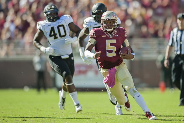 TALLAHASSEE, FL - OCTOBER 4: Quarterback Jameis Winston #5 of the Florida State Seminoles rushes after a sack attempt during the First half at Doak Campbell Stadium on October 4, 2014 in Tallahassee, Florida.  (Photo by Jeff Gammons/Getty Images)