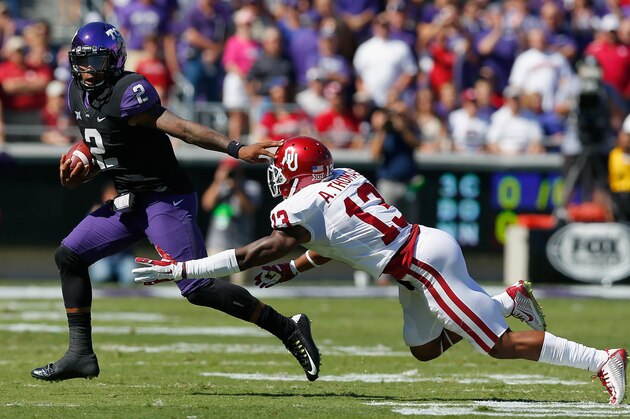 FORT WORTH, TX - OCTOBER 04: Quarterback Trevone Boykin #2 of the TCU Horned Frogs carries the ball against safety Ahmad Thomas #13 of the Oklahoma Sooners in the first half at Amon G. Carter Stadium on October 4, 2014 in Fort Worth, Texas. (Photo by Tom Pennington/Getty Images) FORT WORTH, TX - OCTOBER 04: Quarterback Trevone Boykin #2 of the TCU Horned Frogs carries the ball against safety Ahmad Thomas #13 of the Oklahoma Sooners in the first half at Amon G. Carter Stadium on October 4, 2014 in Fort Worth, Texas. (Photo by Tom Pennington/Getty Images)