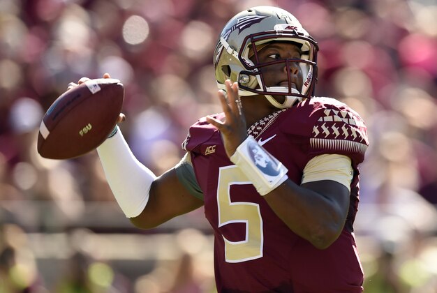Oct 4, 2014; Tallahassee, FL, USA; Florida State Seminoles quarterback Jameis Winston (5) drops back to pass against the Wake Forest Demon Deacons during the first quarter at Doak Campbell Stadium. Mandatory Credit: John David Mercer-USA TODAY Sports