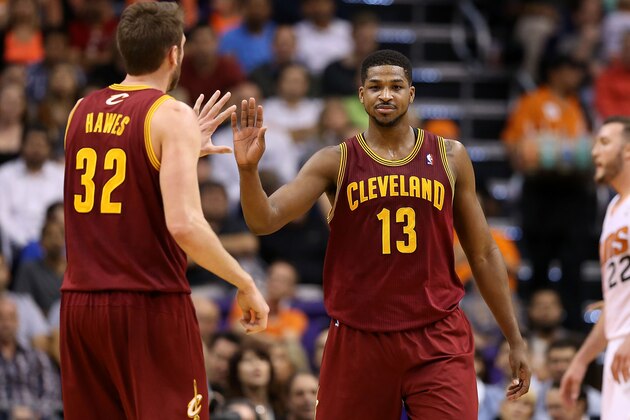 PHOENIX, AZ - MARCH 12:  Tristan Thompson #13 of the Cleveland Cavaliers high fives Spencer Hawes #32 after drawing a foul against the Phoenix Suns during the second half of the NBA game at US Airways Center on March 12, 2014 in Phoenix, Arizona. The Cavaliers defeated the Suns 110-101. NOTE TO USER: User expressly acknowledges and agrees that, by downloading and or using this photograph, User is consenting to the terms and conditions of the Getty Images License Agreement.  (Photo by Christian Petersen/Getty Images)