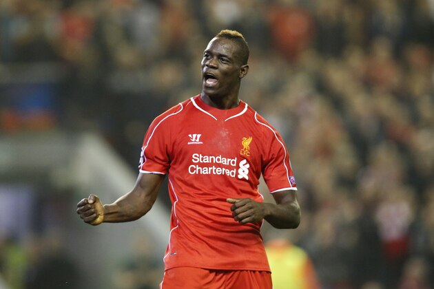 Liverpool's Mario Balotelli celebrates after scoring against Ludogorets during the Champions League Group B soccer match between Liverpool and Ludogorets at Anfield Stadium in Liverpool, England, Tuesday, Sept. 16, 2014. (AP Photo/Jon Super)