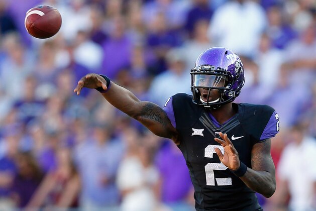 FORT WORTH, TX - OCTOBER 04:  Quarterback Trevone Boykin #2 of the TCU Horned Frogs looks for an open receiver against the Oklahoma Sooners in the second half at Amon G. Carter Stadium on October 4, 2014 in Fort Worth, Texas.  (Photo by Tom Pennington/Getty Images)