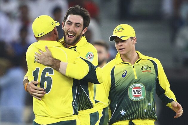 DUBAI, UNITED ARAB EMIRATES - OCTOBER 05:  Glenn Maxwell of Australia celebrates with teammates after dismissing Saad Nasim of Pakistan during the International T20 match between Australia and Pakistan at Dubai Sports City Cricket Stadium on October 5, 2014 in Dubai, United Arab Emirates.  (Photo by Francois Nel/Getty Images)