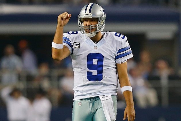 ARLINGTON, TX - SEPTEMBER 28:   Tony Romo #9 of the Dallas Cowboys celebrates a first down against the New Orleans Saints in the second half at AT&T Stadium on September 28, 2014 in Arlington, Texas.  (Photo by Tom Pennington/Getty Images)