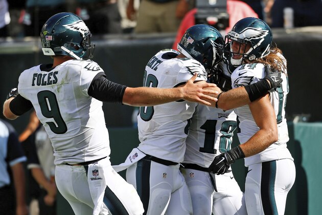 FILE - In this Sept. 7, 2014, file photo, Philadelphia Eagles players, from left, Nick Foles, Zach Ertz, Jeremy Maclin and Riley Cooper celebrate after a touchdown by Maclin during the second half of an NFL football game against the Jacksonville Jaguars in Philadelphia. he Associated Press awards a Comeback Player of the Year in February. Maybe this season the AP should hand out comeback team honors, too. The leaders after two weeks: the Eagles. (AP Photo/Michael Perez, File)