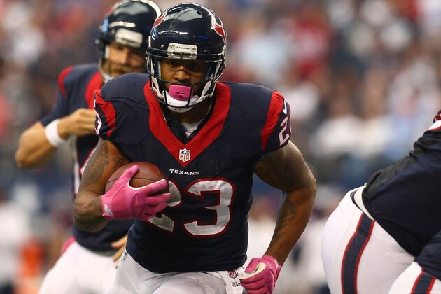 ARLINGTON, TX - OCTOBER 05:  Arian Foster #23 of the Houston Texans runs for a touchdown to tie the game against the Dallas Cowboys in the second half at AT&T Stadium on October 5, 2014 in Arlington, Texas.  (Photo by Ronald Martinez/Getty Images)