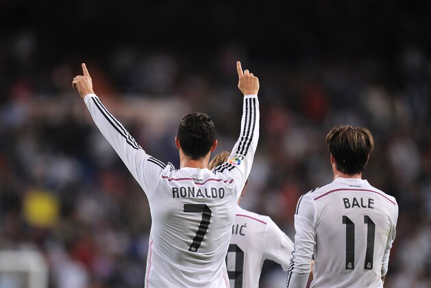 MADRID, SPAIN - OCTOBER 05: Cristiano Ronaldo of Real Madrid celebrates after scoring his team's 5th and his third goal against Club Athletic during the La Liga match between Real Madrid CF and Athletic Club at Estadio Santiago Bernabeu on October 5, 2014 in Madrid, Spain. (Photo by Denis Doyle/Getty Images) MADRID, SPAIN - OCTOBER 05: Cristiano Ronaldo of Real Madrid celebrates after scoring his team's 5th and his third goal against Club Athletic during the La Liga match between Real Madrid CF and Athletic Club at Estadio Santiago Bernabeu on October 5, 2014 in Madrid, Spain. (Photo by Denis Doyle/Getty Images)