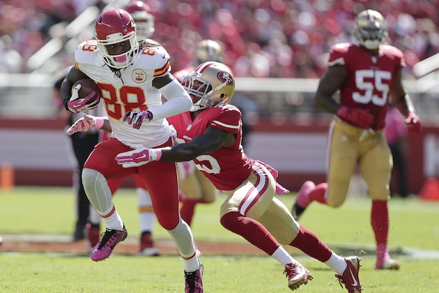 Kansas City Chiefs wide receiver Junior Hemingway (88) runs in front of San Francisco 49ers strong safety Jimmie Ward (25) during the first quarter of an NFL football game in Santa Clara, Calif., Sunday, Oct. 5, 2014. (AP Photo/Marcio Jose Sanchez)