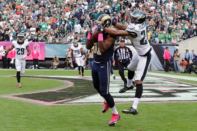 St. Louis Rams' Kenny Britt, front left, pulls in a touchdown pass against Philadelphia Eagles' Bradley Fletcher during the second half of an NFL football game, Sunday, Oct. 5, 2014, in Philadelphia. (AP Photo/Michael Perez)