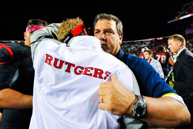 PISCATAWAY, NJ - OCTOBER 04: Head coach Brady Hoke of the Michigan Wolverines hugs Ben McDaniels of the Rutgers Scarlet Knights at High Point Solutions Stadium on October 4, 2014 in Piscataway, New Jersey.  (Photo by Alex Goodlett/Getty Images)