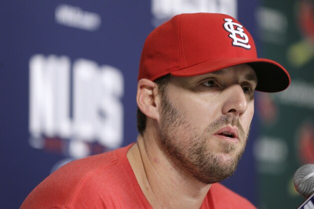 St. Louis Cardinals starting pitcher John Lackey speaks during a news conference, Sunday, Oct. 5, 2014, in St. Louis. The Cardinals play the Los Angeles Dodgers in the National League Division Series game 3 baseball game on Monday. (AP Photo/Charlie Neibergall)