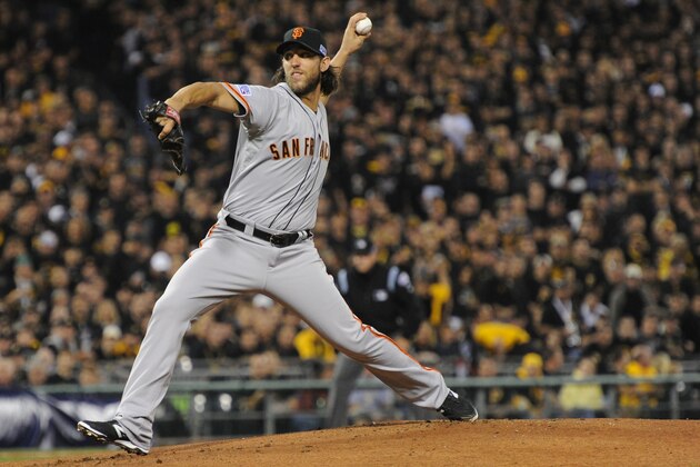 San Francisco Giants starting pitcher Madison Bumgarner throws against the Pittsburgh Pirates in the first inning of the wild-card playoff baseball game on Wednesday, Oct. 1, 2014, in Pittsburgh. (AP Photo/Don Wright)