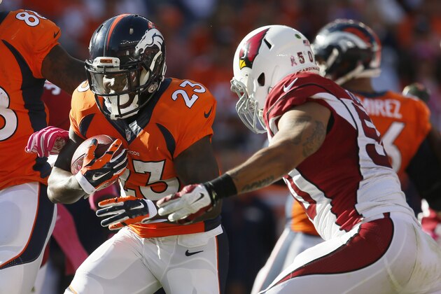 Denver Broncos running back Ronnie Hillman (23) runs against the Arizona Cardinals during the second half of an NFL football game, Sunday, Oct. 5, 2014, in Denver. (AP Photo/Joe Mahoney)