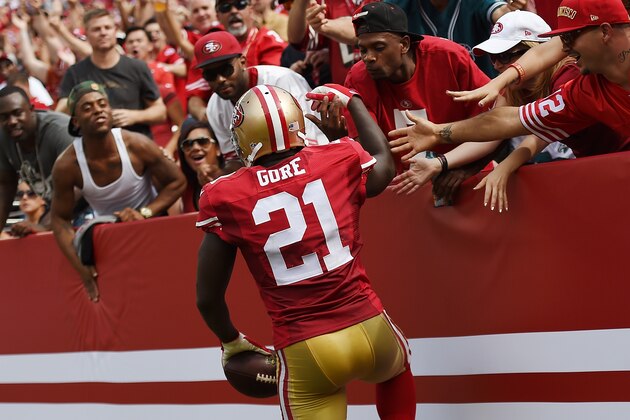 SANTA CLARA, CA - SEPTEMBER 28:  Frank Gore #21 of the San Francisco 49ers celebrates with fans after scoring a touchdown against the Philadelphia Eagles during the second quarter at Levi's Stadium on September 28, 2014 in Santa Clara, California. The 49ers won the game 26-21. (Photo by Thearon W. Henderson/Getty Images)
