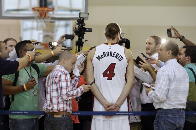 Miami Heat forward Josh McRoberts is interviewed during NBA basketball media day, Friday, Sept. 26, 2014, in Miami. (AP Photo/Lynne Sladky)
