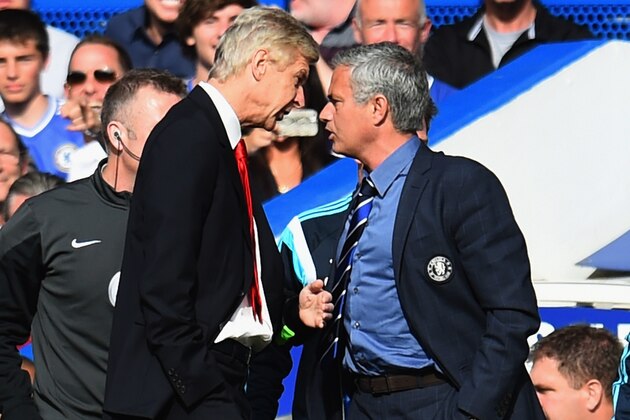 LONDON, ENGLAND - OCTOBER 05:  Managers Arsene Wenger of Arsenal and Jose Mourinho manager of Chelsea clash during the Barclays Premier League match between Chelsea and Arsenal at Stamford Bridge on October 4, 2014 in London, England.  (Photo by Shaun Botterill/Getty Images)