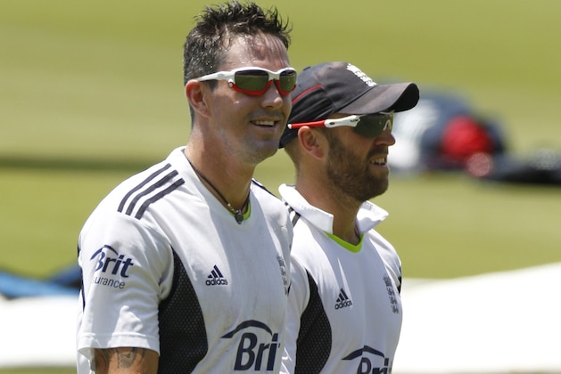England's Kevin Pietersen, left, is franked by teammate Matt Prior during training ahead of the second Ashes cricket test against England in Sydney, Australia, Thursday, Dec. 2, 2010. The second test match starts Friday, Dec. 3. (AP Photo/Rob Griffith)
