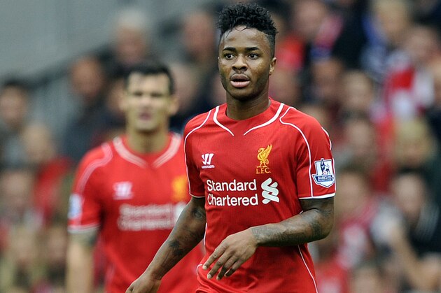 Liverpool's Raheem Sterling in action during their English Premier League soccer match against Everton at Anfield in Liverpool, England, Saturday Sept. 27, 2014. (AP Photo/Clint Hughes)