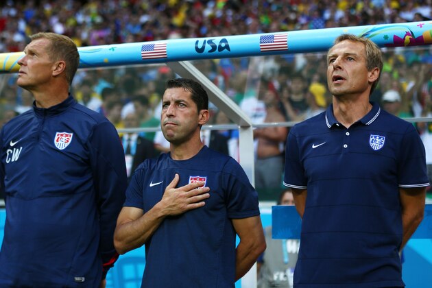 SALVADOR, BRAZIL - JULY 01: (L-R) Goalkeeper coach Chris Woods, assistant coach Tab Ramos and head coach Jurgen Klinsmann of the United States look on during the National Anthem prior to the 2014 FIFA World Cup Brazil Round of 16 match between Belgium and the United States at Arena Fonte Nova on July 1, 2014 in Salvador, Brazil.  (Photo by Michael Steele/Getty Images)
