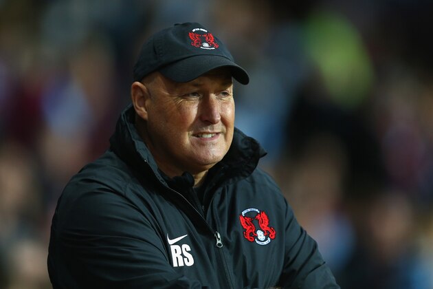 BIRMINGHAM, ENGLAND - AUGUST 27:  Russell Slade of Leyton Orient looks on during the Capital One Cup second round match between Aston Villa and Leyton Orient at Villa Park on August 27, 2014 in Birmingham, England.  (Photo by Clive Mason/Getty Images)