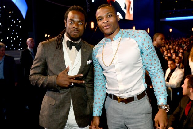 Richard Sherman, left, and Russell Westbrook pose in the audience at the ESPY Awards at the Nokia Theatre on Wednesday, July 16, 2014, in Los Angeles. (Photo by Jordan Strauss/Invision/AP)