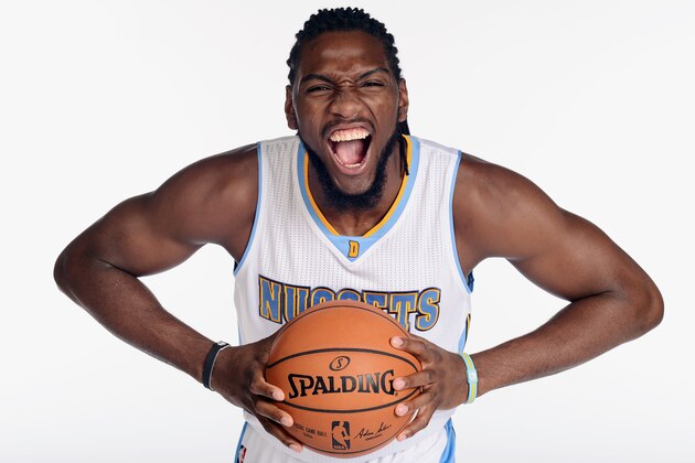 DENVER, CO - SEPTEMBER 29: Kenneth Faried #35 of the Denver Nuggets poses for a photo during media day on September 29, 2014 at the Pepsi Center in Denver, Colorado. NOTE TO USER: User expressly acknowledges and agrees that, by downloading and/or using this Photograph, user is consenting to the terms and conditions of the Getty Images License Agreement. Mandatory Copyright Notice: Copyright 2014 NBAE (Photo by Garrett W. Ellwood/NBAE via Getty Images)