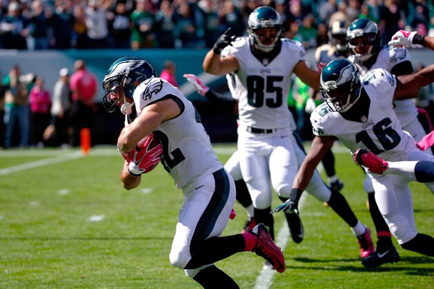 Philadelphia Eagles' Chris Maragos, left, scores a touchdown after recovering a blocked punt during the first half of an NFL football game against the St. Louis Rams, Sunday, Oct. 5, 2014, in Philadelphia. (AP Photo/Matt Rourke)