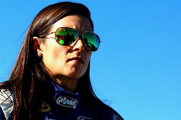 KANSAS CITY, KS - OCTOBER 03:  (EDITOR'S NOTE: Image was processed using digital filters.) Danica Patrick, driver of the #10 Aspen Dental Chevrolet, looks on during qualifying for the NASCAR Sprint Cup Series Hollywood Casino 400 at Kansas Speedway on October 3, 2014 in Kansas City, Kansas.  (Photo by Sarah Glenn/Getty Images)