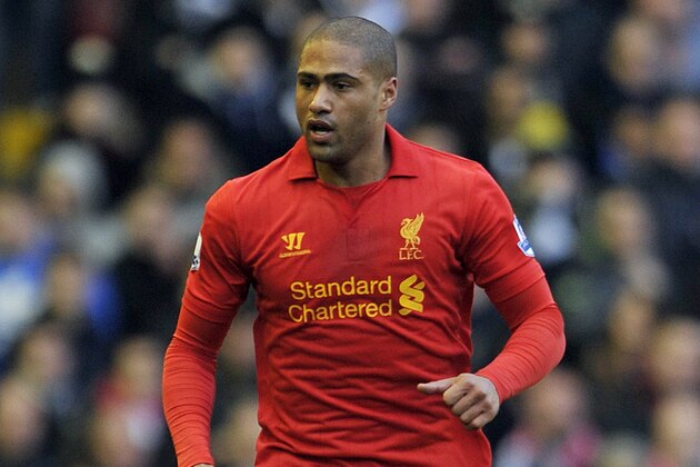 Liverpool's Glen Johnson in action during their English Premier League soccer match against Tottenham Hotspur at Anfield in Liverpool, England, Sunday March 10, 2013. (AP Photo/Clint Hughes)