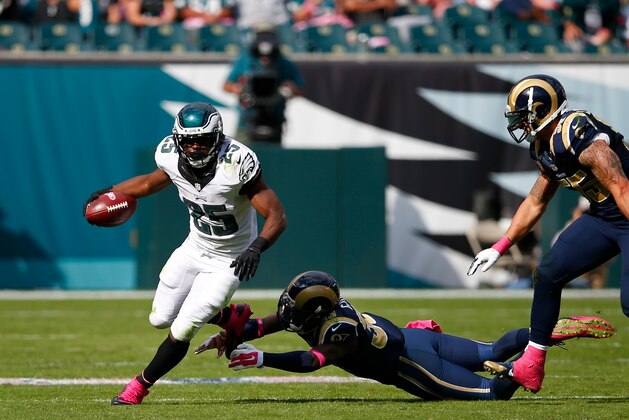 Philadelphia Eagles' LeSean McCoy rushes during the second half of an NFL football game against the St. Louis Rams, Sunday, Oct. 5, 2014, in Philadelphia. (AP Photo/Michael Perez)