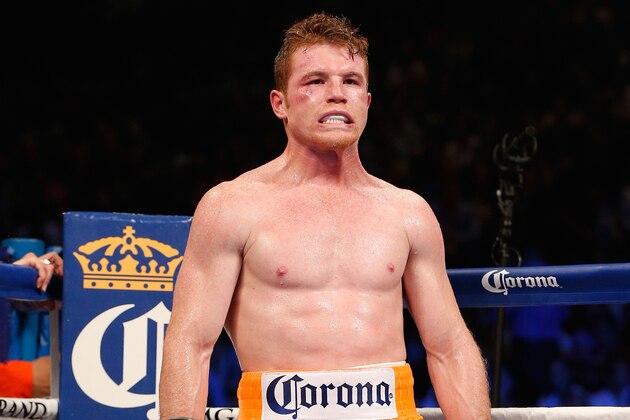LAS VEGAS, NV - JULY 12: Canelo Alvarez stands in the ring between rounds during his junior middleweight bout against Erislandy Lara at the MGM Grand Garden Arena on July 12, 2014 in Las Vegas, Nevada. Alvarez defeated Lara by split decision. (Photo by Josh Hedges/Getty Images) LAS VEGAS, NV - JULY 12: Canelo Alvarez stands in the ring between rounds during his junior middleweight bout against Erislandy Lara at the MGM Grand Garden Arena on July 12, 2014 in Las Vegas, Nevada. Alvarez defeated Lara by split decision. (Photo by Josh Hedges/Getty Images)