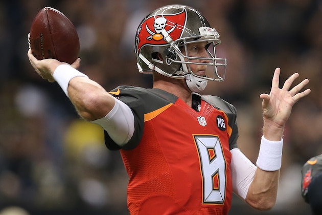 NEW ORLEANS, LA - OCTOBER 05:  Mike Glennon #8 of the Tampa Bay Buccaneers throws a pass against the New Orleans Saints at the Mercedes-Benz Superdome on October 5, 2014 in New Orleans, Louisiana.  (Photo by Chris Graythen/Getty Images)