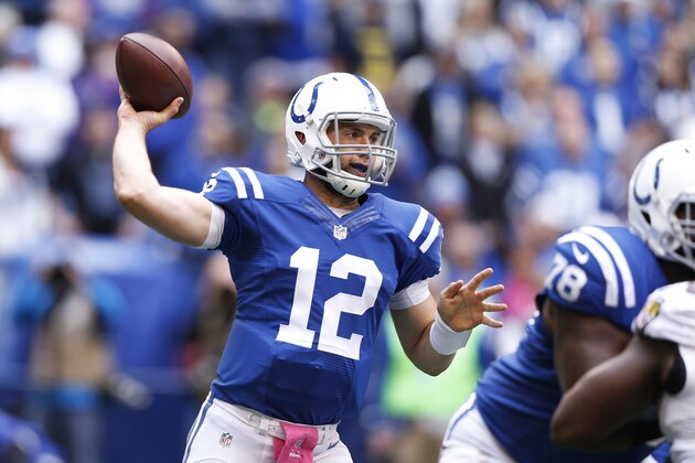 INDIANAPOLIS, IN - OCTOBER 5: Andrew Luck #12 of the Indianapolis Colts throws a pass in the first half of the game against the Baltimore Ravens at Lucas Oil Stadium on October 5, 2014 in Indianapolis, Indiana. (Photo by Joe Robbins/Getty Images)