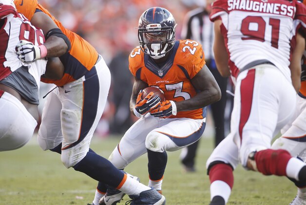 Oct 5, 2014; Denver, CO, USA; Denver Broncos running back Ronnie Hillman (23) runs the ball during the second half against the Arizona Cardinals at Sports Authority Field at Mile High. The Broncos won 41-20.  Mandatory Credit: Chris Humphreys-USA TODAY Sports
