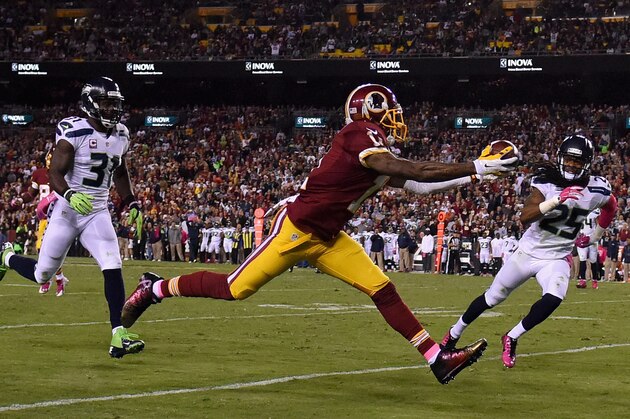 LANDOVER, MD - OCTOBER 06: Wide receiver DeSean Jackson #11 of the Washington Redskins makes a second quarter touchdown catch against the Seattle Seahawks at FedExField on October 6, 2014 in Landover, Maryland.  (Photo by Patrick Smith/Getty Images)