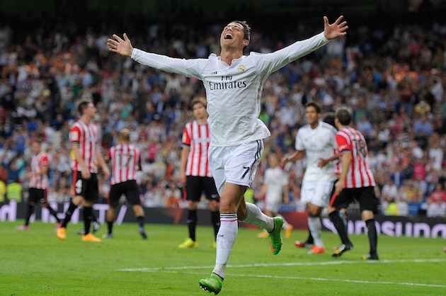 MADRID, SPAIN - OCTOBER 05: Cristiano Ronaldo of Real Madrid celebrates after scoring his team's 5th and his third goal against Club Athletic during the La Liga match between Real Madrid CF and Athletic Club at Estadio Santiago Bernabeu on October 5, 2014 in Madrid, Spain. (Photo by Denis Doyle/Getty Images) MADRID, SPAIN - OCTOBER 05: Cristiano Ronaldo of Real Madrid celebrates after scoring his team's 5th and his third goal against Club Athletic during the La Liga match between Real Madrid CF and Athletic Club at Estadio Santiago Bernabeu on October 5, 2014 in Madrid, Spain. (Photo by Denis Doyle/Getty Images)