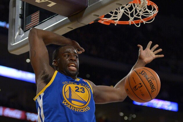 Golden State Warriors forward Draymond Green dunks during the second half of an NBA basketball game against the Los Angeles Lakers, Friday, Nov. 22, 2013, in Los Angeles. (AP Photo/Mark J. Terrill)