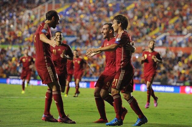 VALENCIA, SPAIN - SEPTEMBER 08:  Paco Alcacer celebrates with David Silva after scoring Spain's 2nd goal during the UEFA EURO 2016 Group C Qualifier between Spain and FYR of Macedonia at Estadio Ciutat de Valencia on September 8, 2014 in Valencia, Spain.  (Photo by Denis Doyle/Getty Images)