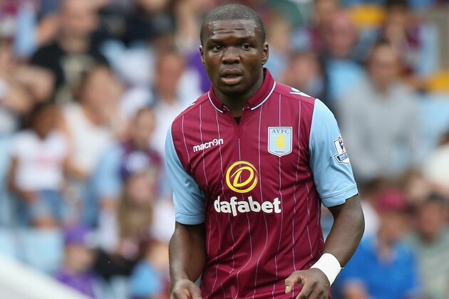 BIRMINGHAM, ENGLAND - AUGUST 09:  Jores Okore of Aston Villa looks on during the pre season friendly match between Aston Villa and Parma at Villa Park on August 9, 2014 in Birmingham, England.  (Photo by David Rogers/Getty Images)